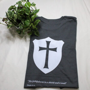 Shield on shirt.